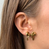 VIOLET RIBBON STUDS