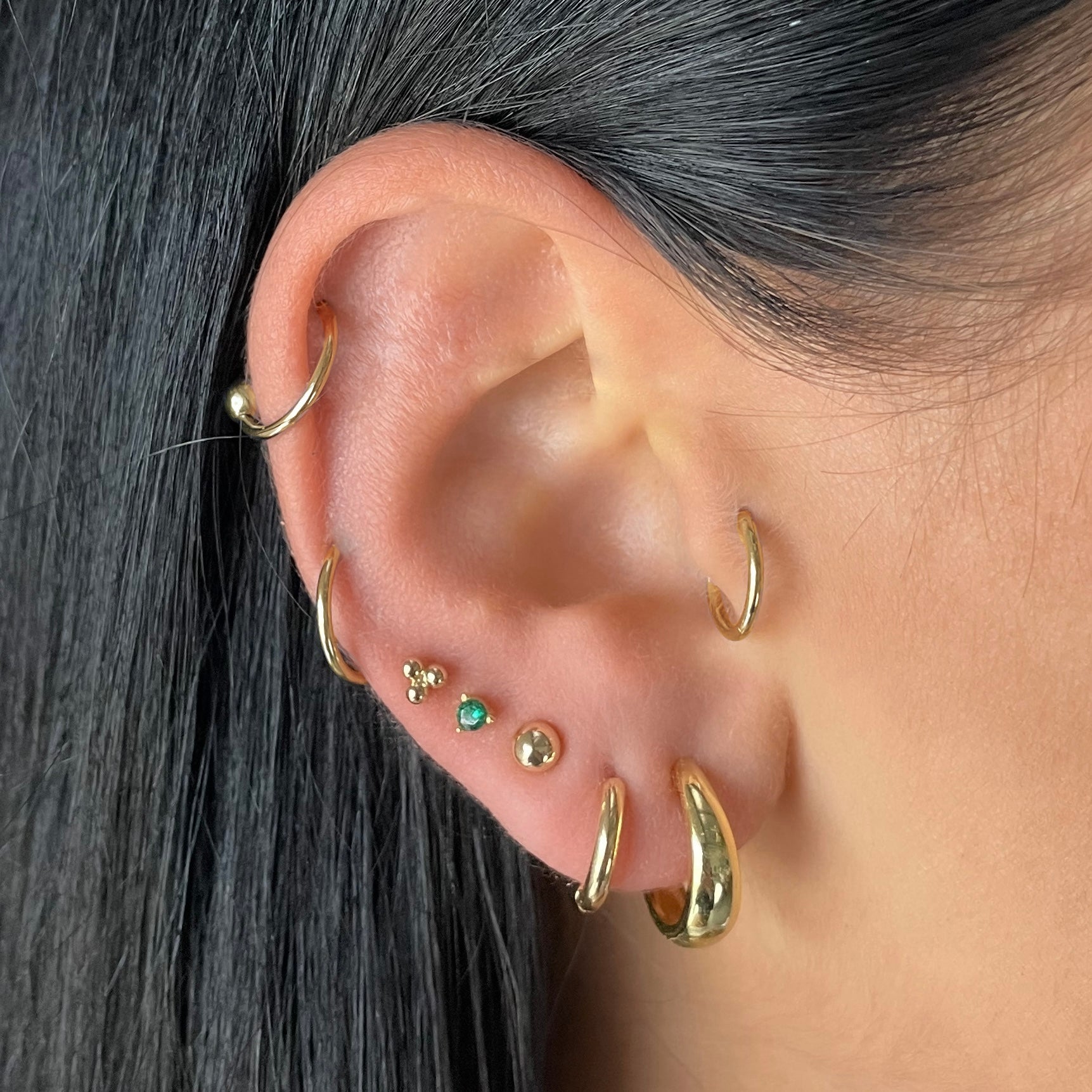 Isabella ear outlet piercing